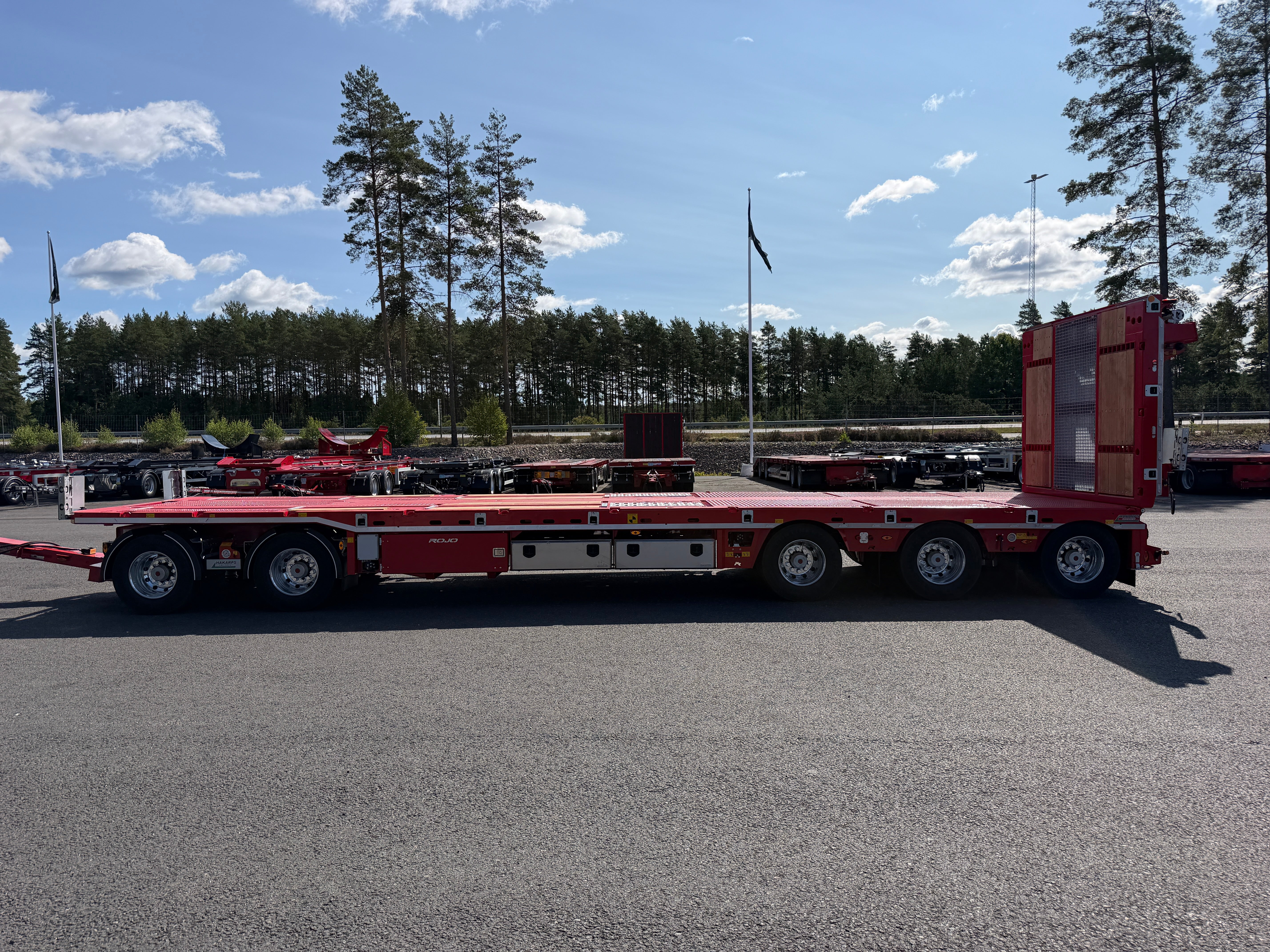 5 axlad 42 tons plan maskinvagn med uppvikbar ramp
