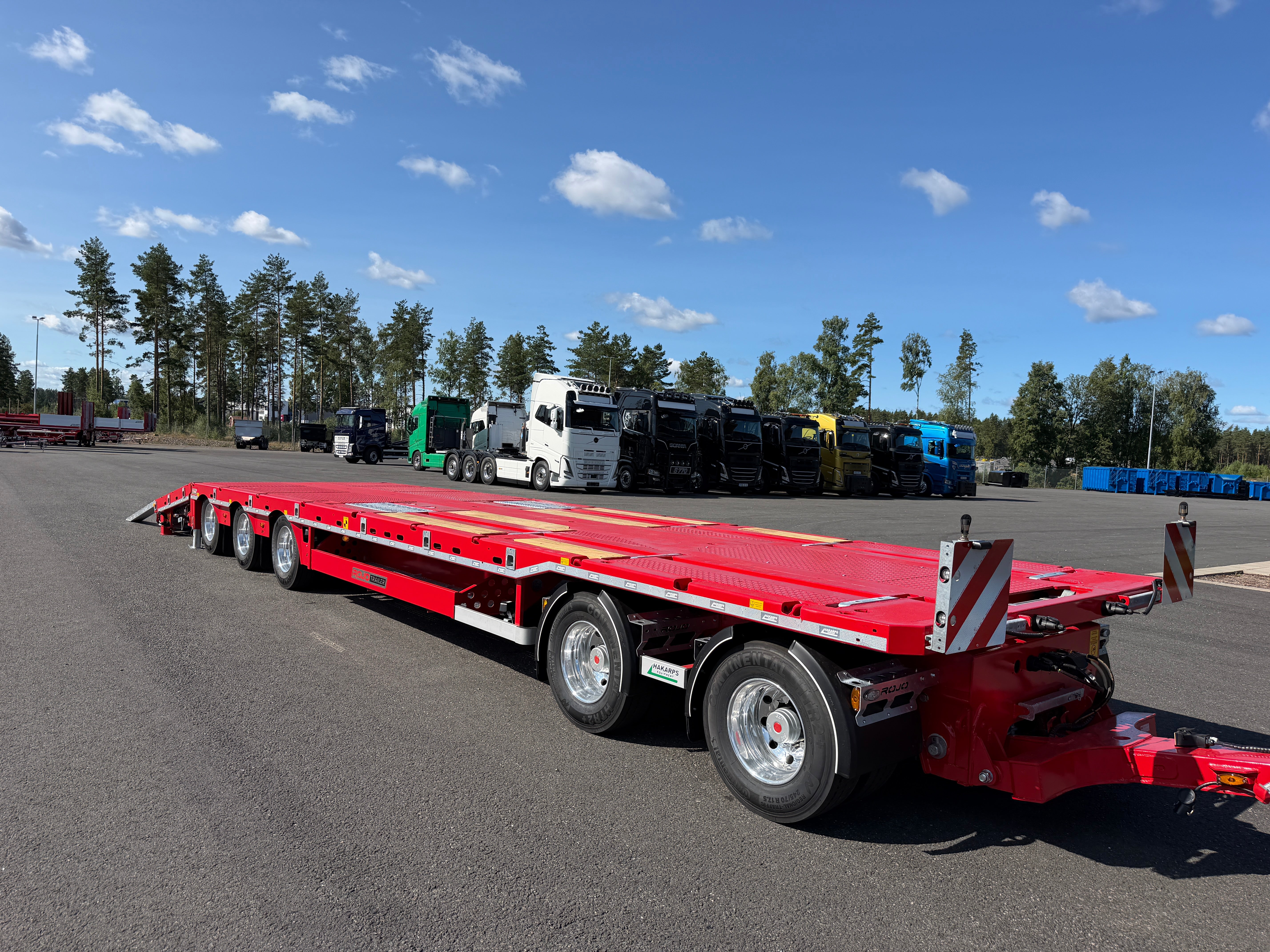 5 axlad 42 tons plan maskinvagn med uppvikbar ramp