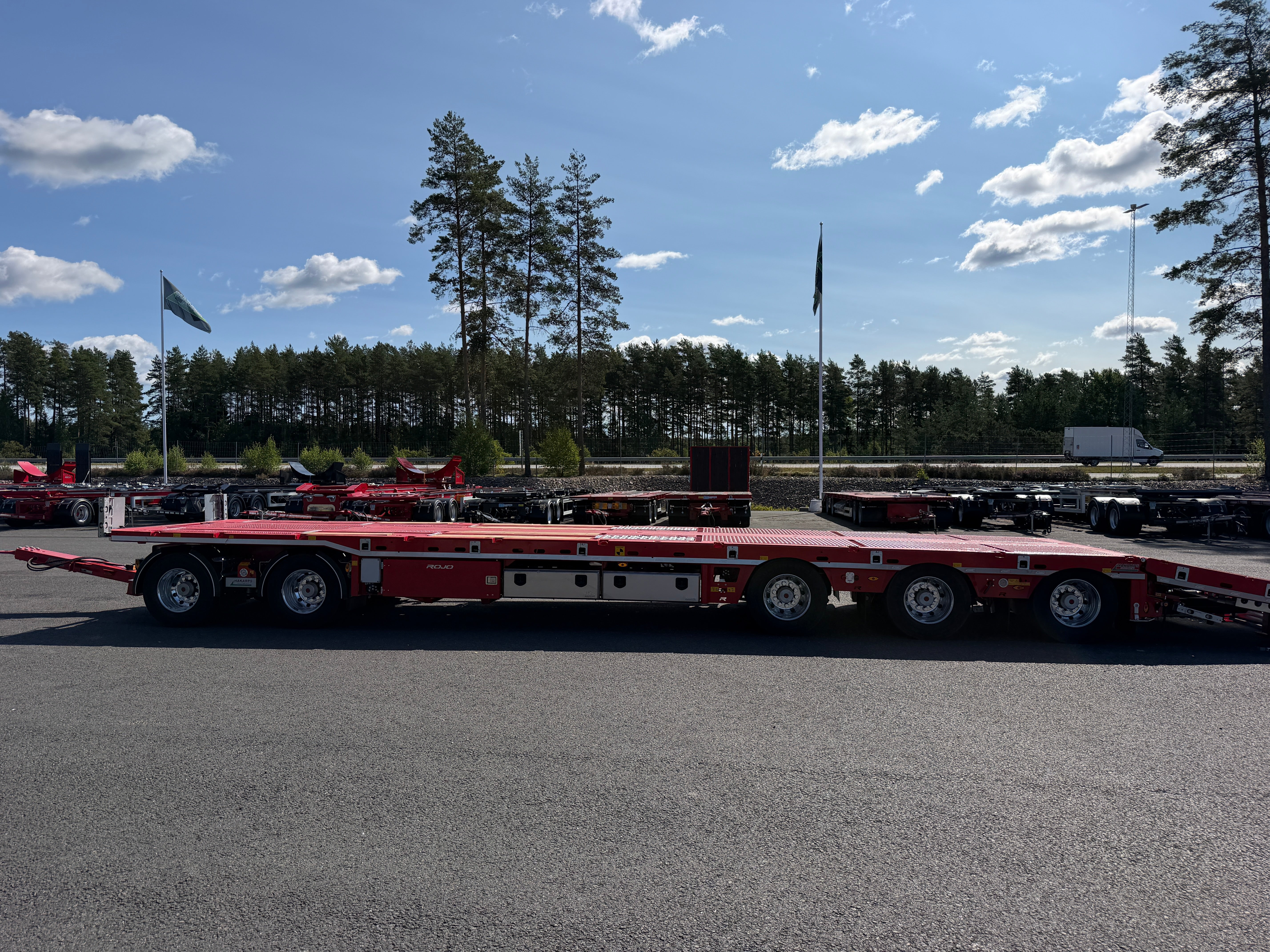 5 axlad 42 tons plan maskinvagn med uppvikbar ramp