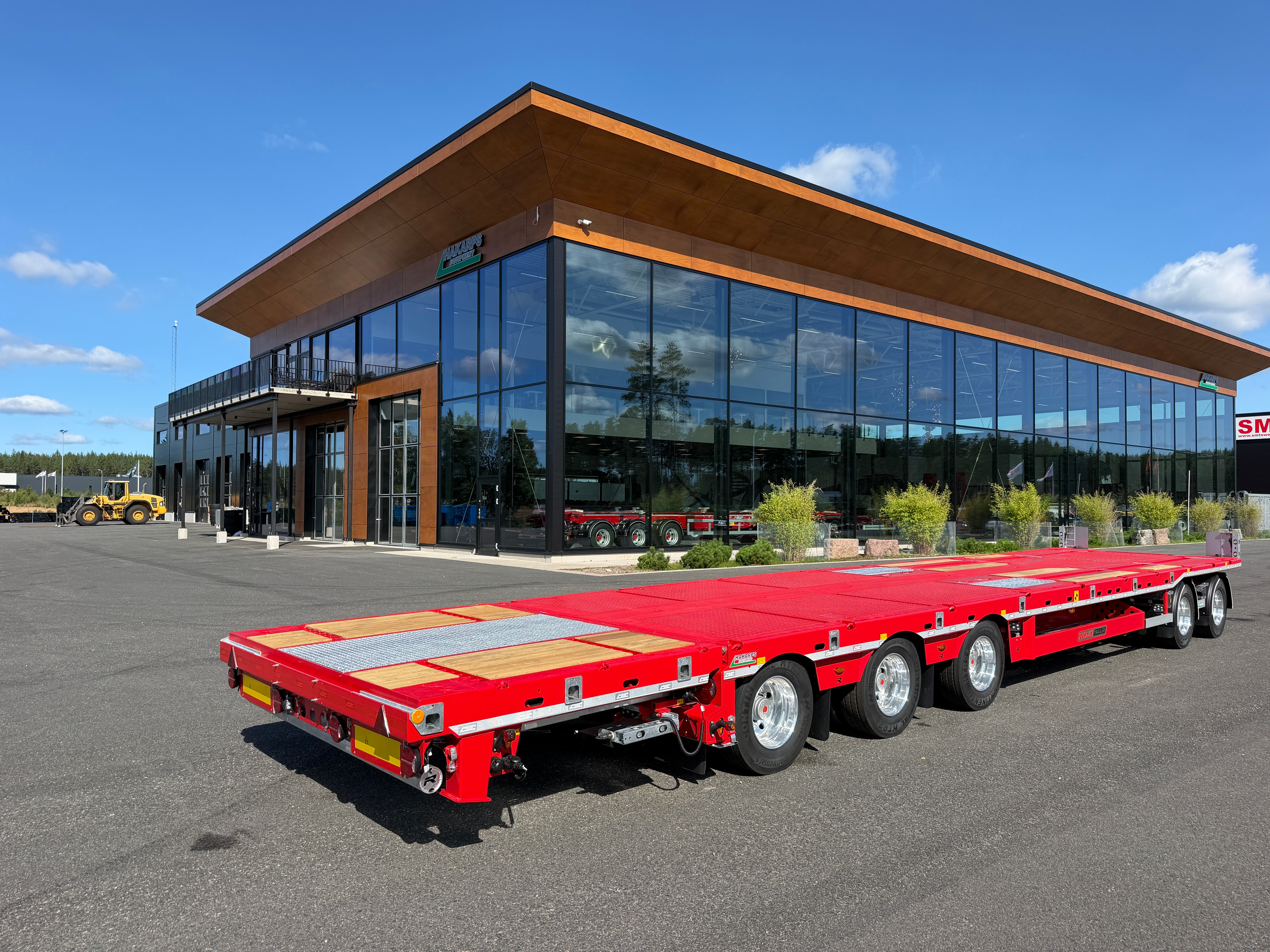 5 axlad 42 tons plan maskinvagn med uppvikbar ramp