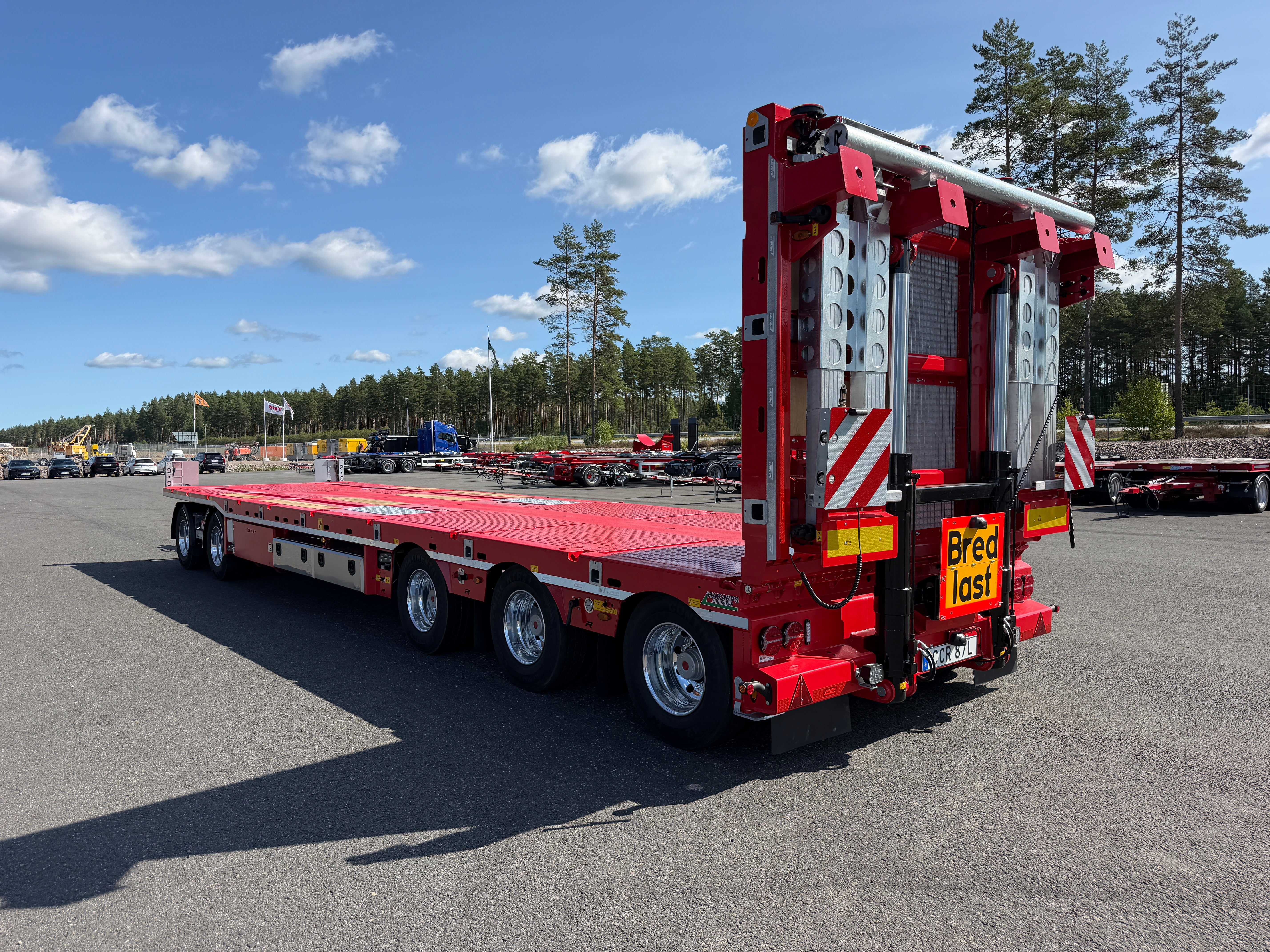 5 axlad 42 tons plan maskinvagn med uppvikbar ramp