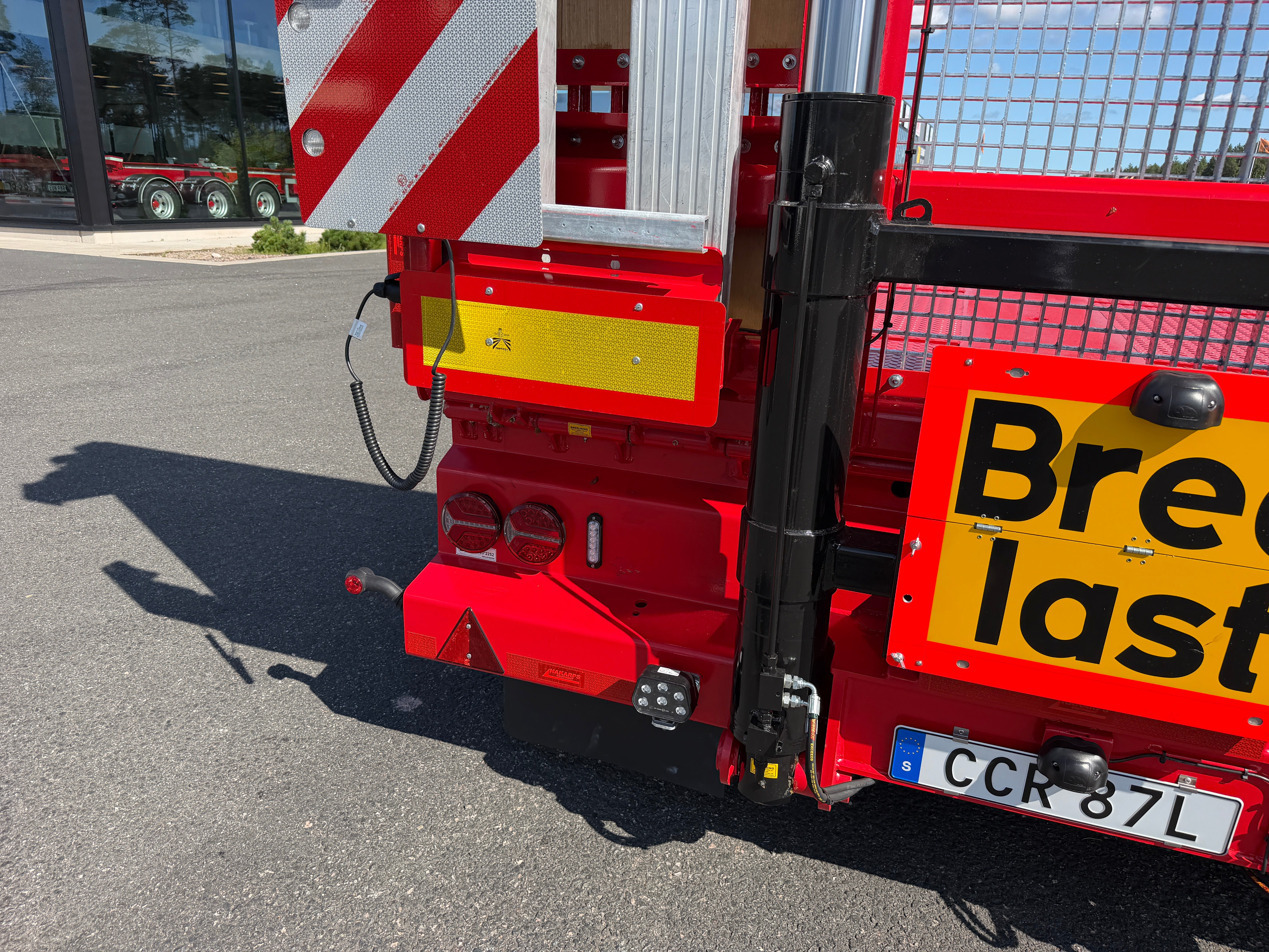 5 axlad 42 tons plan maskinvagn med uppvikbar ramp