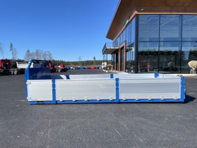 Lastväxlarflak med alulämmar grusförstärkt tridem sedd från sidan