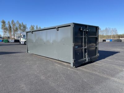 Svart container med skuren framstam.