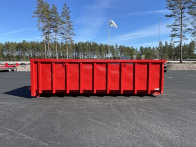 Röd snöcontainer från sidan.